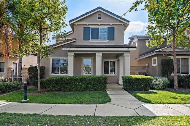 view of front of property featuring a front yard