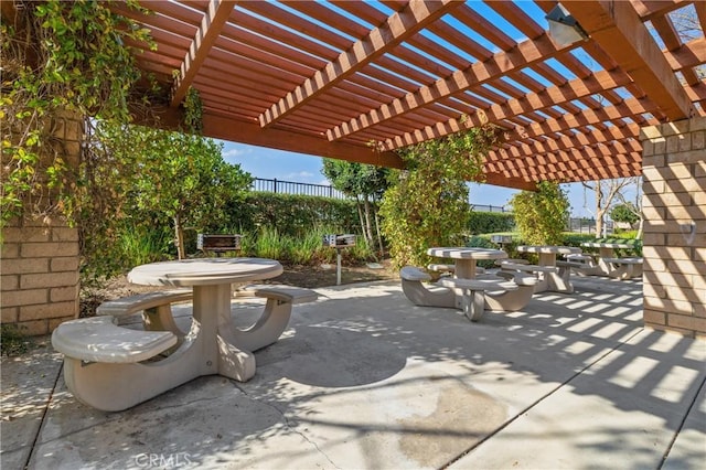 view of patio featuring a pergola