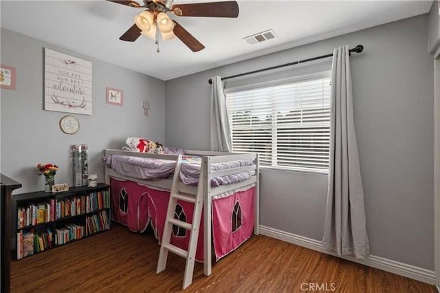 bedroom with hardwood / wood-style flooring and ceiling fan