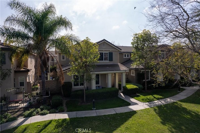 view of front of property with a front lawn