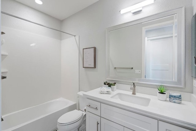 full bathroom featuring vanity, tub / shower combination, and toilet