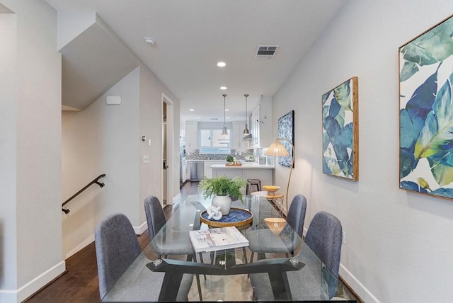 dining room featuring dark wood-type flooring