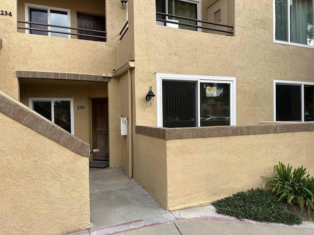 doorway to property with a balcony