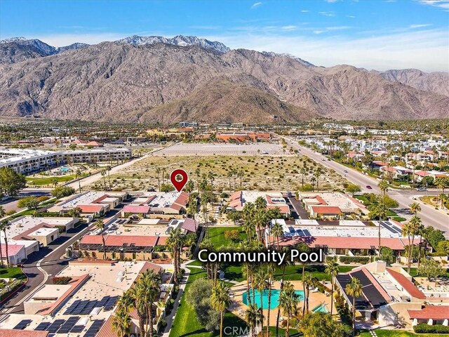 drone / aerial view featuring a mountain view