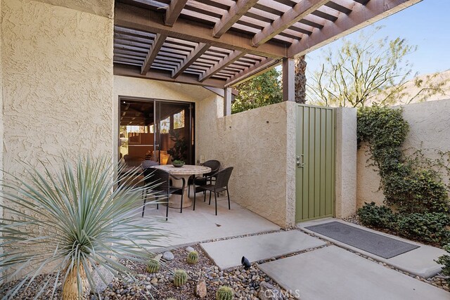 view of patio featuring a pergola