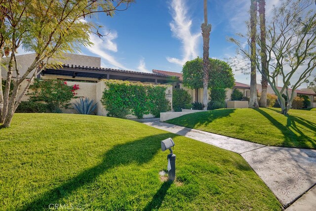 view of front of home with a front yard