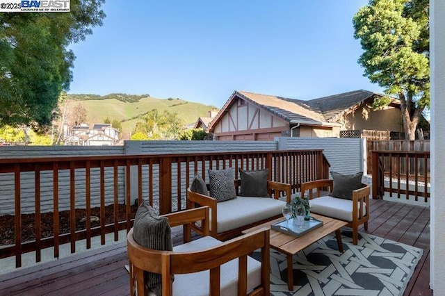 wooden terrace with a mountain view