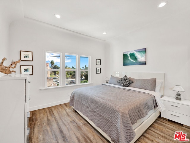 bedroom featuring light hardwood / wood-style flooring