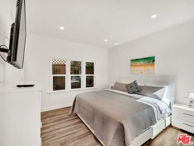 bedroom featuring light wood-type flooring