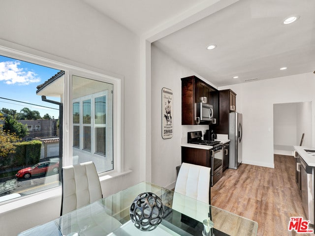 dining room featuring light hardwood / wood-style flooring