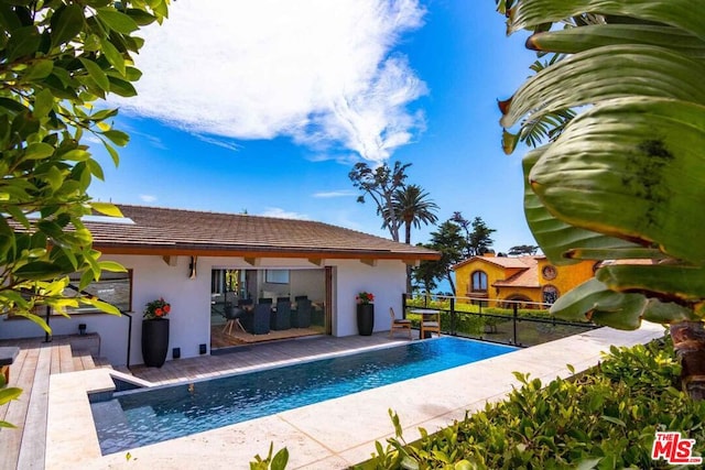 view of pool featuring a patio area