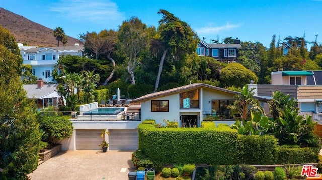 view of front of property featuring a garage