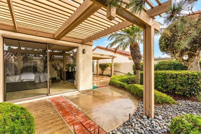 view of patio featuring a pergola