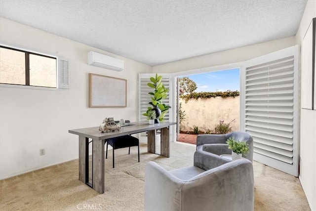 home office with an AC wall unit, a healthy amount of sunlight, light carpet, and a textured ceiling