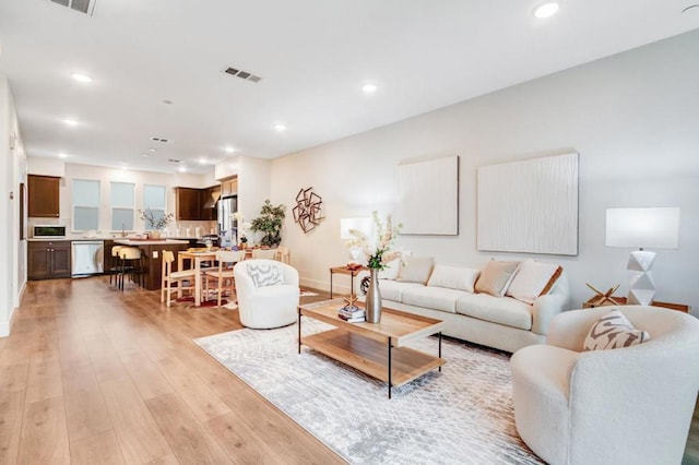 living room featuring light wood-type flooring