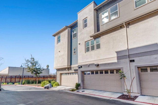 exterior space with a garage