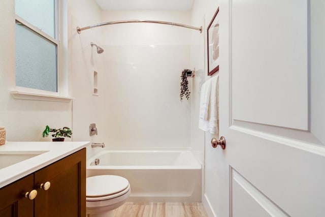 full bathroom with vanity,  shower combination, and toilet