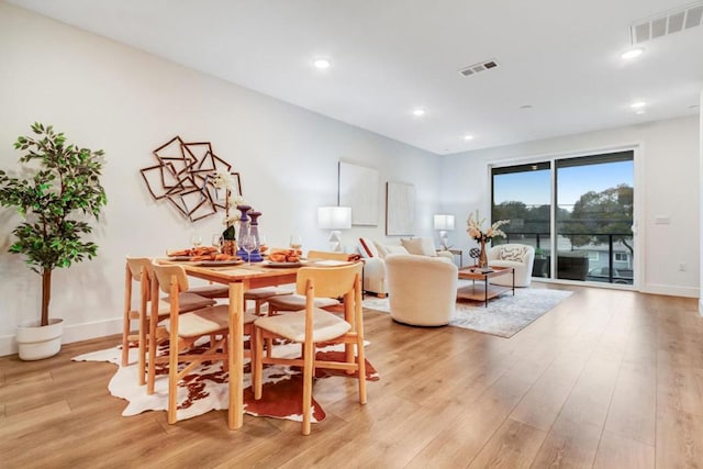 dining area featuring light hardwood / wood-style floors