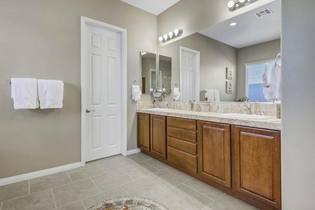 bathroom with vanity and tile patterned floors