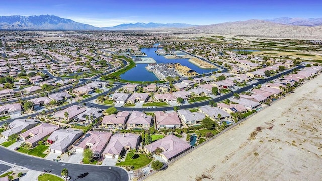 bird's eye view featuring a water and mountain view