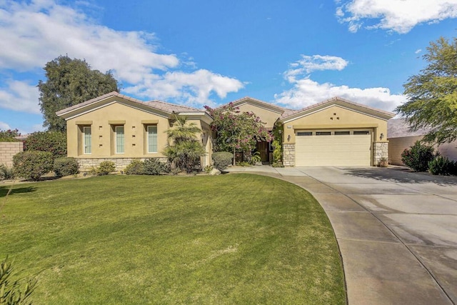 mediterranean / spanish-style house with a garage and a front lawn