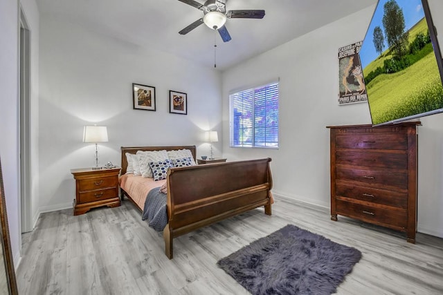 bedroom featuring ceiling fan and light hardwood / wood-style floors