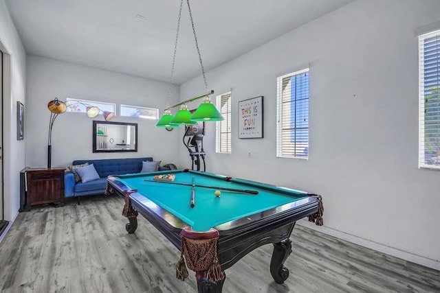 game room with hardwood / wood-style flooring and billiards