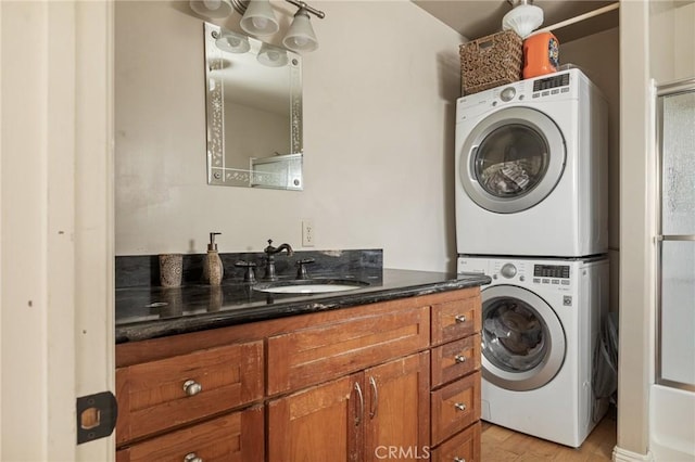 laundry room with stacked washer and dryer, sink, and light wood-type flooring