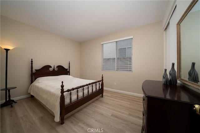 bedroom featuring light hardwood / wood-style flooring