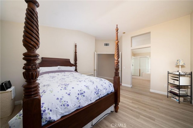 bedroom with light wood-type flooring