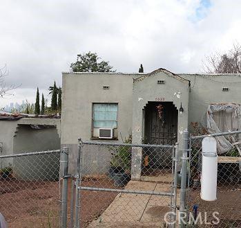 view of front of property with cooling unit