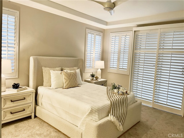 bedroom with light colored carpet