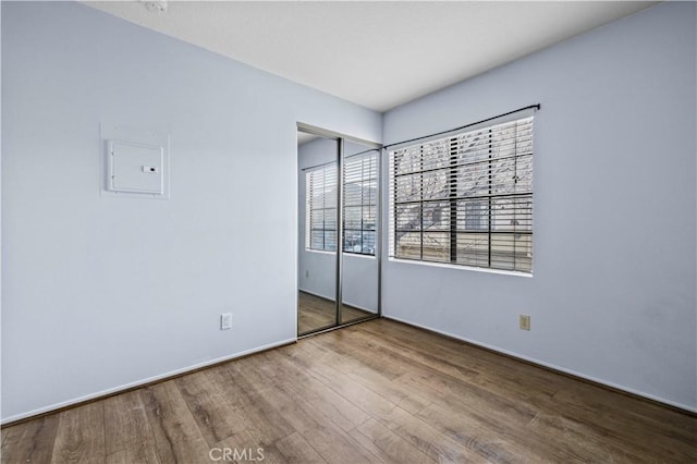 empty room featuring hardwood / wood-style floors