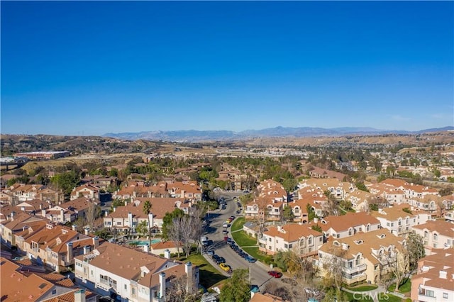 drone / aerial view featuring a mountain view