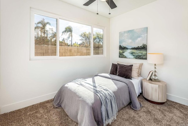 bedroom with ceiling fan and carpet