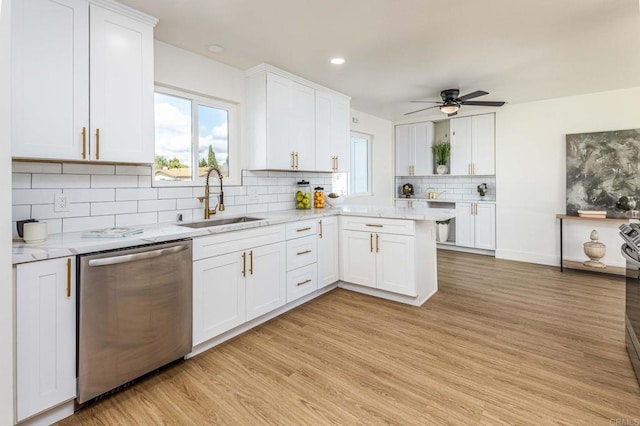 kitchen featuring white cabinetry, sink, and appliances with stainless steel finishes