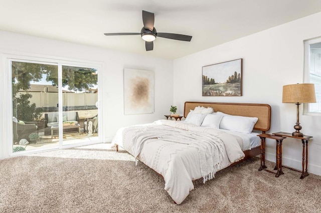 carpeted bedroom with access to exterior and ceiling fan