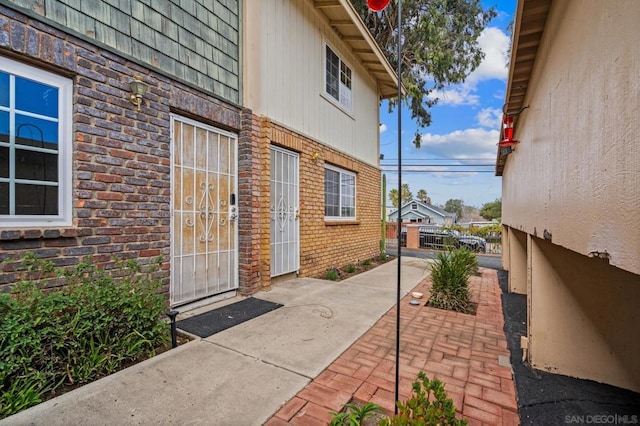 doorway to property featuring a patio