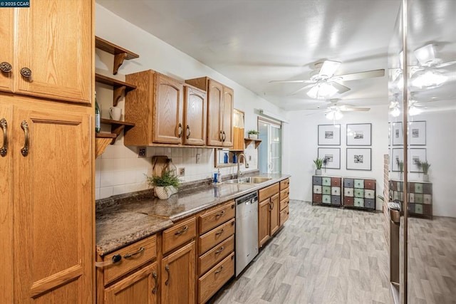 kitchen with sink, light hardwood / wood-style flooring, dishwasher, ceiling fan, and backsplash