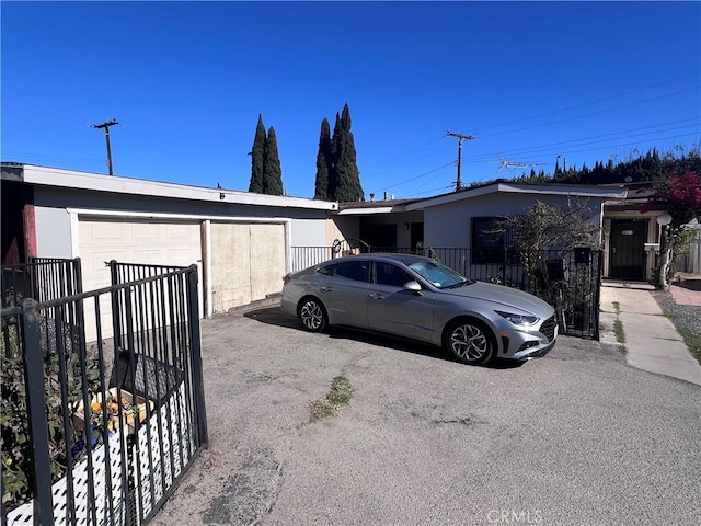 view of side of property featuring a garage