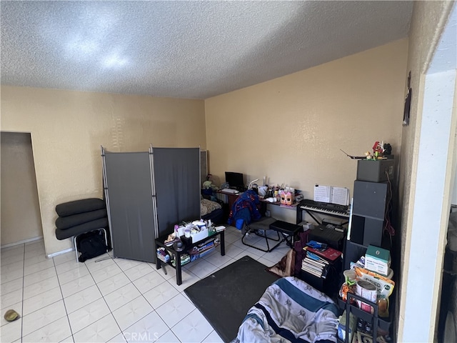 interior space with a textured ceiling