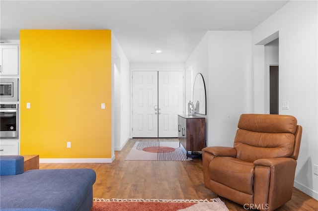 living room with wood-type flooring