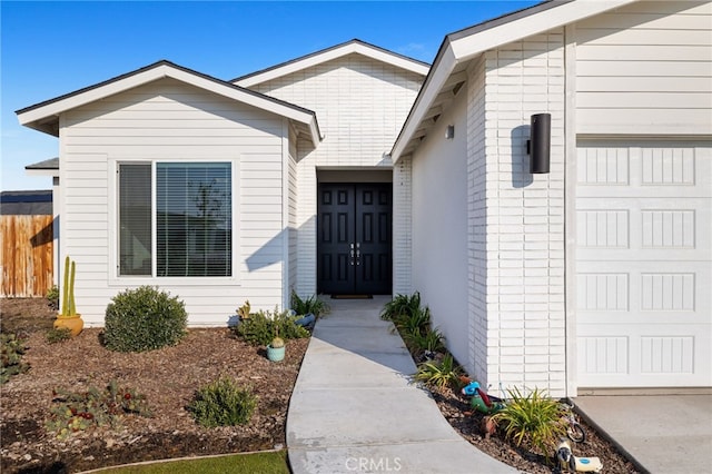 entrance to property with a garage