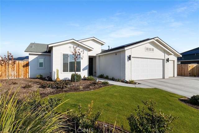 single story home featuring a garage and a front lawn