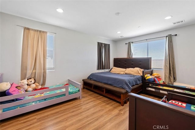 bedroom featuring light hardwood / wood-style flooring