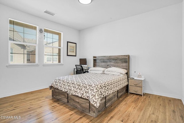 bedroom featuring light hardwood / wood-style floors