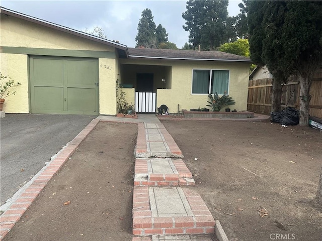 view of front of property with a garage