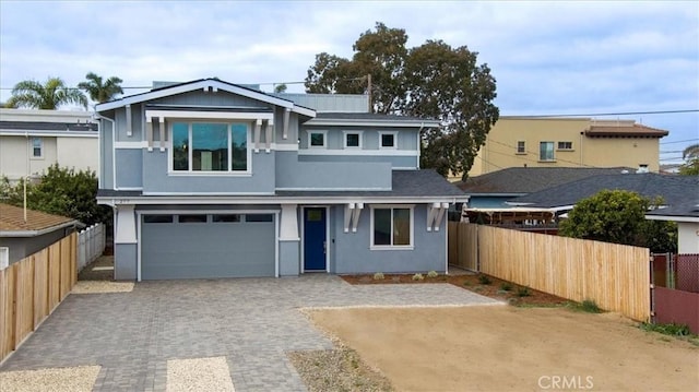 view of front of home with a garage