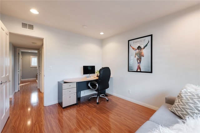 office area with light hardwood / wood-style flooring