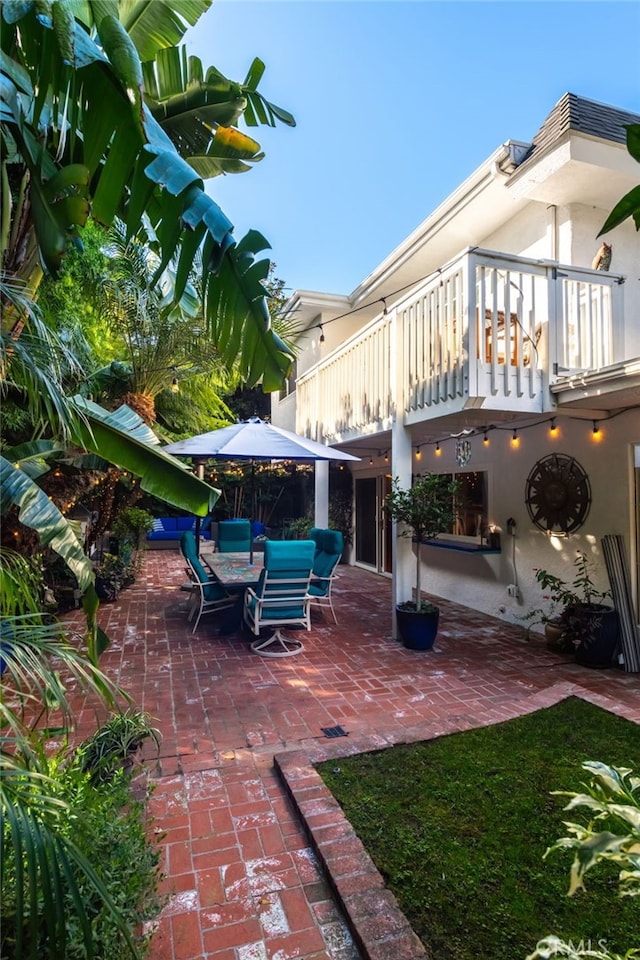 view of patio / terrace featuring a balcony